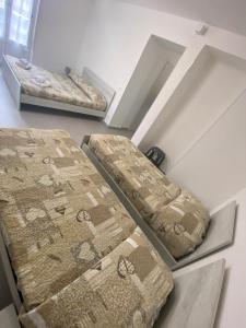 Postel nebo postele na pokoji v ubytování Affittacamere La Casa Dei Nonni