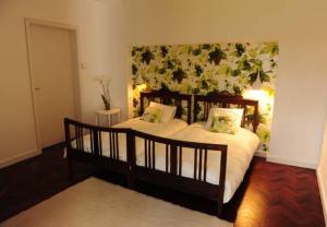 Cama ou camas em um quarto em Casa Do Populo