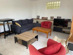 Część wypoczynkowa w obiekcie Le Gîte de Félix - Maison chaleureuse 190m2 - 6 ch - 20pers