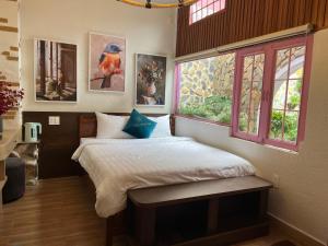 Villa Hoa Da客房内的一张或多张床位
