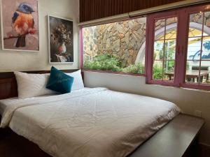 Villa Hoa Da客房内的一张或多张床位