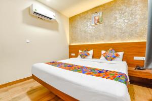 Katil atau katil-katil dalam bilik di FabHotel KPL Prime