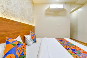 Katil atau katil-katil dalam bilik di FabHotel KPL Prime