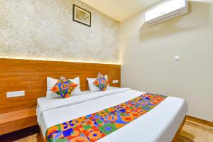 Katil atau katil-katil dalam bilik di FabHotel KPL Prime