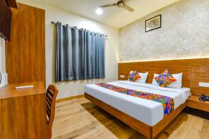 Katil atau katil-katil dalam bilik di FabHotel KPL Prime
