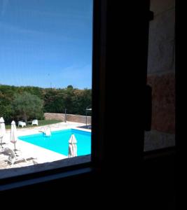 Vista sulla piscina di Vacanza In Puglia o su una piscina nei dintorni