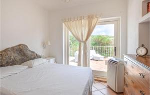 Postel nebo postele na pokoji v ubytování Nice Home In Le Saline With 3 Bedrooms