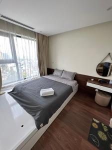 Ένα ή περισσότερα κρεβάτια σε δωμάτιο στο Imperia Garden 143 Nguyễn Tuân Thanh Xuân +22 φωτογραφίες