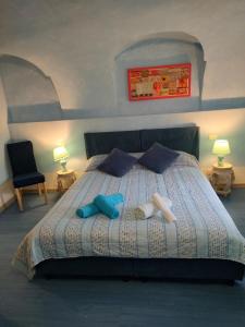 La Nuvola tesisinde bir odada yatak veya yataklar