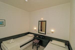 Tempat tidur dalam kamar di Villa Aristea