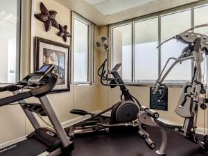 a gym with two treadmills and a treadmill at Windemere #1104 in Perdido Key +64 photos