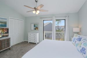 Voodi või voodid majutusasutuse Barrier Dunes 164 - 144 Bay Breeze by Pristine Properties Vacation Rentals toas