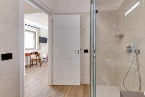 Koupelna v ubytování RoccaRegina Hotel