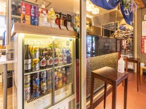 Η κουζίνα ή μικρή κουζίνα στο Omotenashi Hostel Miyajima