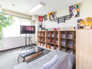 Μια τηλεόραση ή/και κέντρο ψυχαγωγίας στο Omotenashi Hostel Miyajima