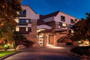 a rendering of a hotel at night at Courtyard by Marriott San Diego Rancho Bernardo in Rancho Bernardo