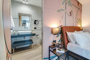 Postel nebo postele na pokoji v ubytování RoccaRegina Hotel + 37 fotografií
