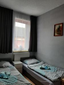 Postel nebo postele na pokoji v ubytování Noclegi Viktor
