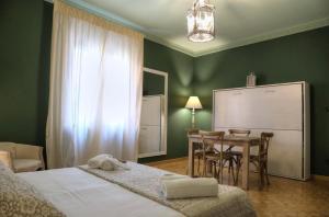 Postel nebo postele na pokoji v ubytování La Casetta di Lina Rooms and Apartments