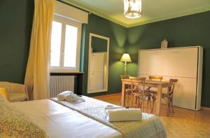 Postel nebo postele na pokoji v ubytování La Casetta di Lina Rooms and Apartments