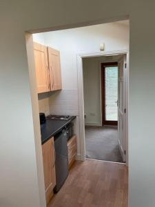 Kuchyň nebo kuchyňský kout v ubytování Self catering apartment at Beechwalk House.
