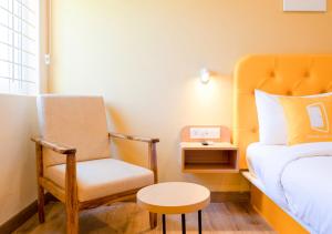 Una cama o camas en una habitación de Bloom Hotel - HSR Layout Sector 3