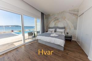 Posteľ alebo postele v izbe v ubytovaní Villa Bella Vista am Meer