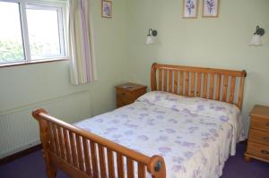 Letto o letti in una camera di Ardrinane House