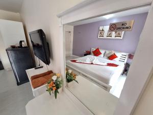 TV a/nebo společenská místnost v ubytování Sea Boss Homestay
