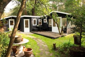 Fotografie z fotogalerie ubytování Magisch huisje direct aan het Veluwse bos. v destinaci Putten