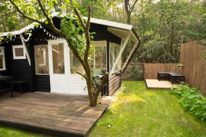 Fotografie z fotogalerie ubytování Magisch huisje direct aan het Veluwse bos. v destinaci Putten