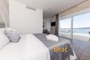 Posteľ alebo postele v izbe v ubytovaní Villa Bella Vista am Meer
