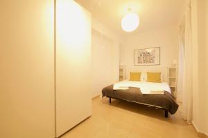 Posteľ alebo postele v izbe v ubytovaní FUN BUILDING FLATS by HOMEABOUT