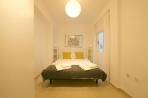 Posteľ alebo postele v izbe v ubytovaní FUN BUILDING FLATS by HOMEABOUT