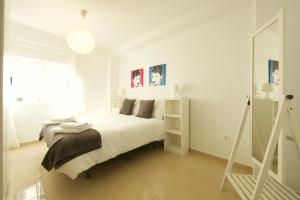 Posteľ alebo postele v izbe v ubytovaní FUN BUILDING FLATS by HOMEABOUT