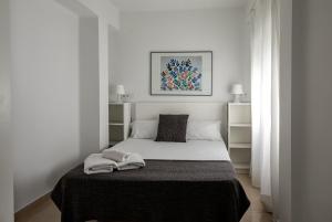 Posteľ alebo postele v izbe v ubytovaní FUN BUILDING FLATS by HOMEABOUT