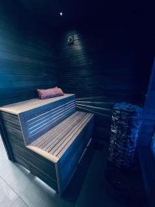 a blue room with two bunk beds in it at Holiday home with sauna in the Arctic Caribbean, Tromsø in Tromsø
