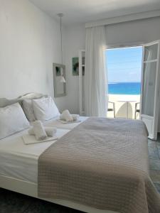 A bed or beds in a room at Vavanos Studios