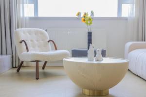 Ένα ή περισσότερα κρεβάτια σε δωμάτιο στο Warm Four Bedroom Apartment with Huangpu River View