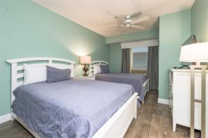 Postel nebo postele na pokoji v ubytování Unit 711 Ocean Walk - 3 Bedroom Ocean Front + 19 fotografií