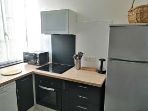 Kuchnia lub aneks kuchenny w obiekcie Appartement montagne
