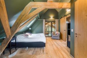 Voodi või voodid majutusasutuse Hoeve De Zuidhoek toas