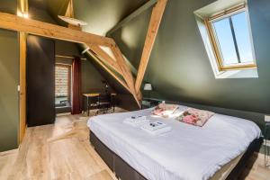 Voodi või voodid majutusasutuse Hoeve De Zuidhoek toas