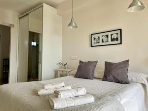 Posteľ alebo postele v izbe v ubytovaní Apartamento Calma Tuga