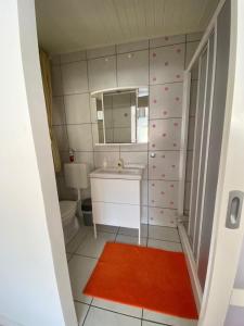 Kúpeľňa v ubytovaní Do-Ti Apartmanház Balatonlelle