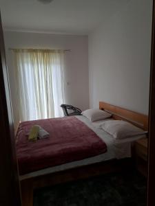 Postel nebo postele na pokoji v ubytování Apartman Ema 2