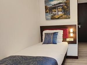 מיטה או מיטות בחדר ב-CN-Hotel