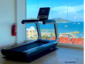 a treadmill in a room with a view of the ocean at Casa Le Dream (03) in Kuah