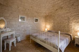Voodi või voodid majutusasutuse Borgo D'Itria toas