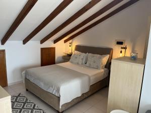Postel nebo postele na pokoji v ubytování Sea View Loft